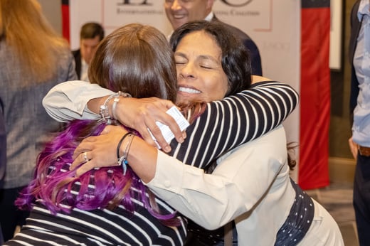 Atendees hugging